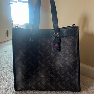 Coach field tote in black and brown horse and carriage canvas